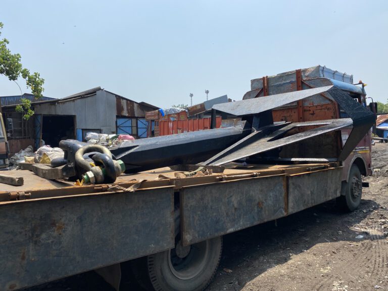 Truck loaded with large anchors and shackles