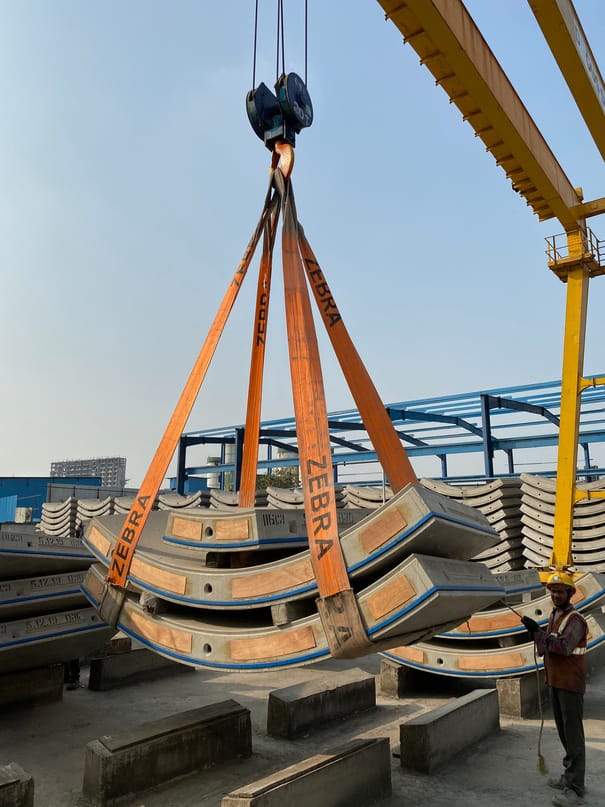 Zebra webbing slings in use on a lift